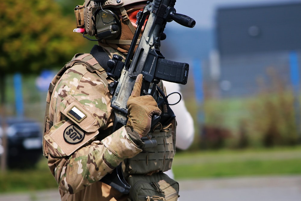 a soldier with a gun in his hand