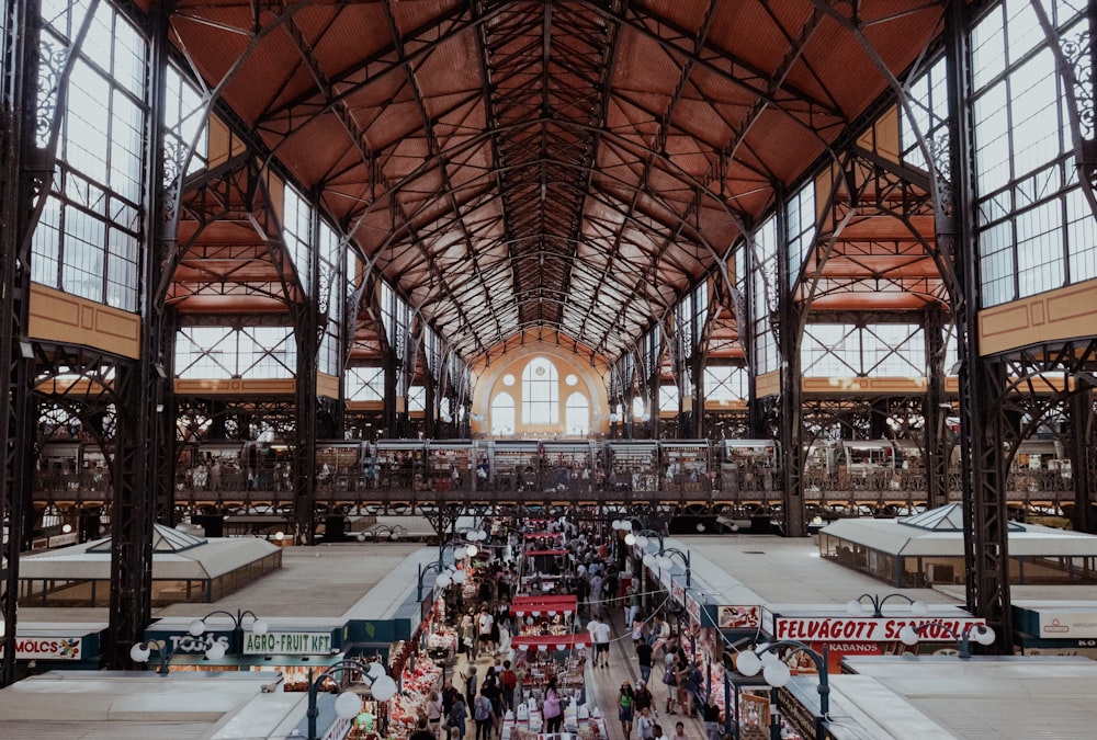 a large indoor market with lots of people