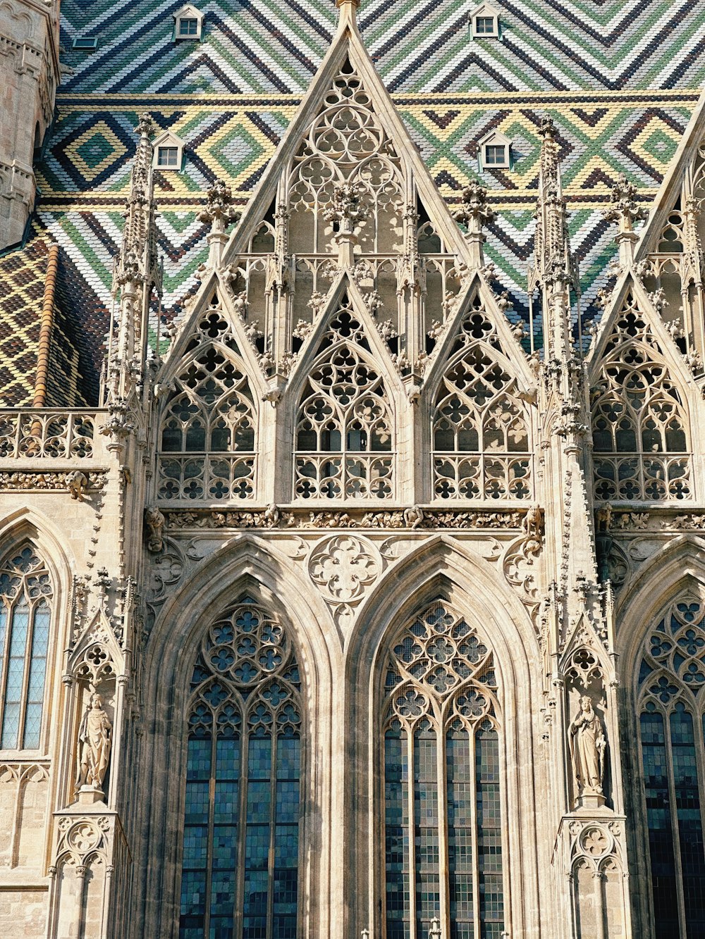 a large cathedral with a clock on the front of it