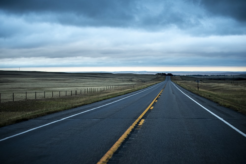 a long empty road in the middle of nowhere