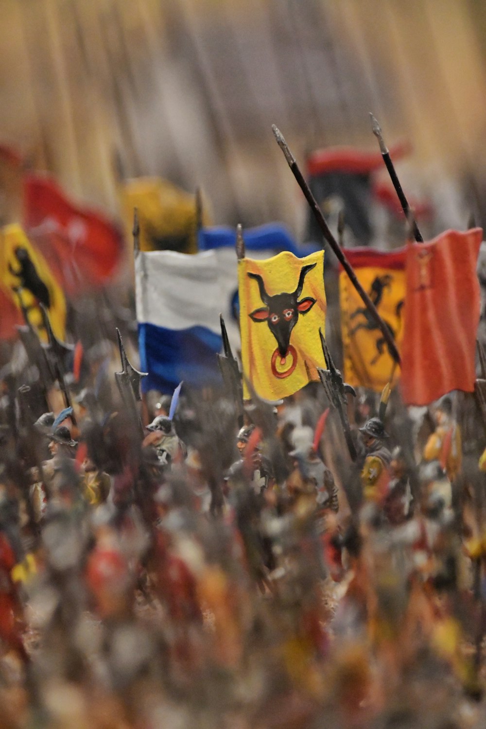 a large group of toy soldiers with flags
