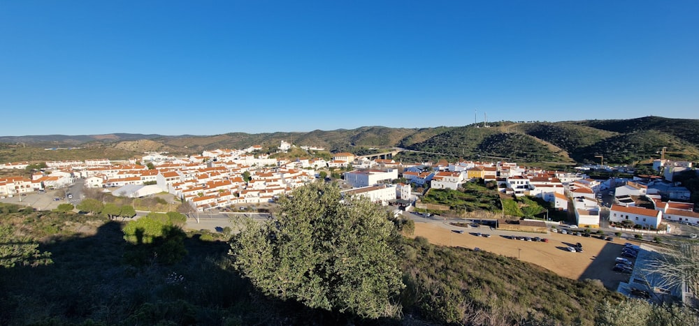 a view of a town from a hill