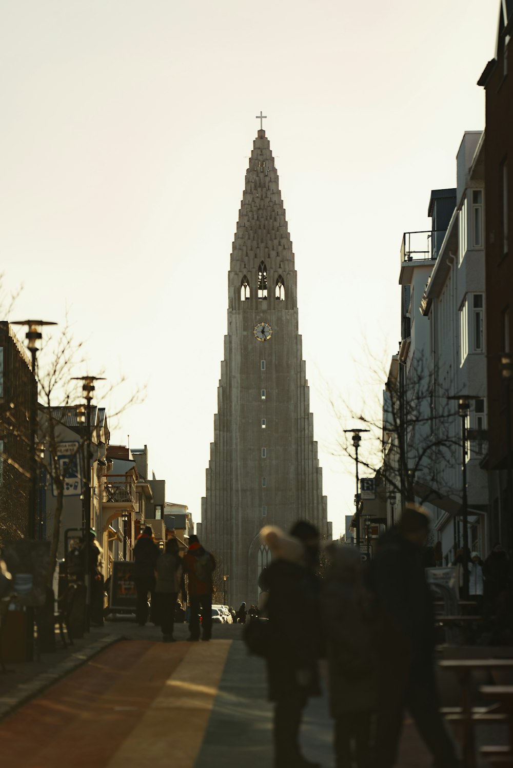 a tall clock tower towering over a city