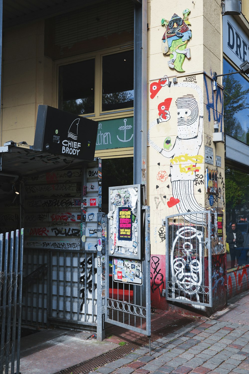 a building with a bunch of graffiti on the side of it