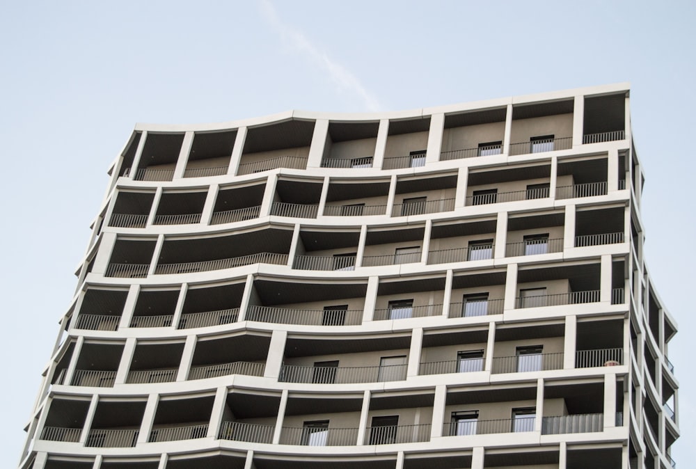 a tall building with balconies and balconies on it