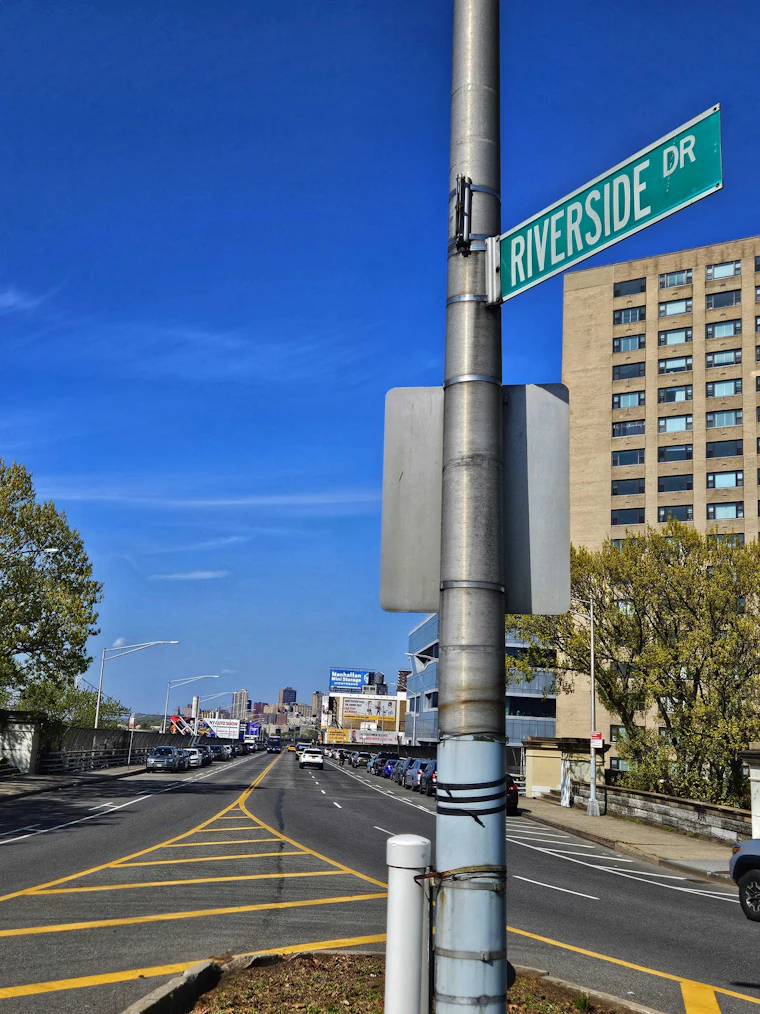 Riverside Drive street sign beside the Henry Hudson Parkway on Manhattan's west side
