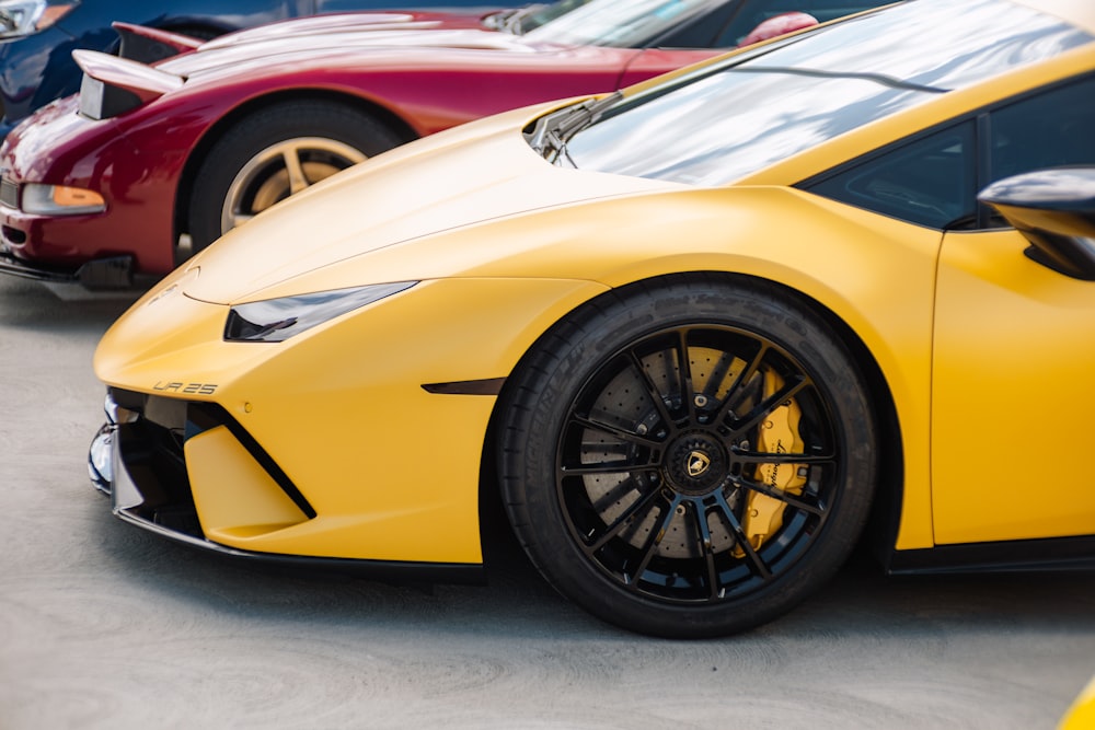 a yellow sports car parked in a parking lot