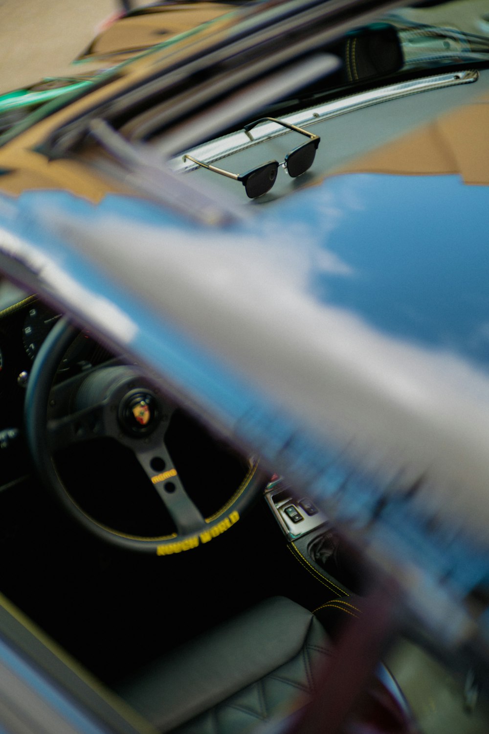 the interior of a car with a steering wheel