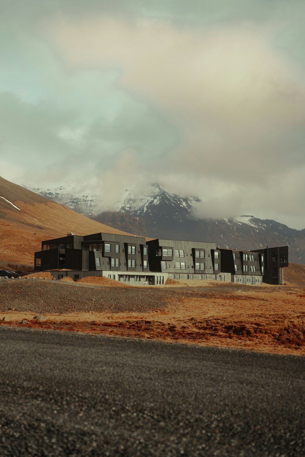 a large building sitting on the side of a road