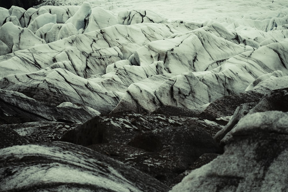 a black and white photo of a glacier