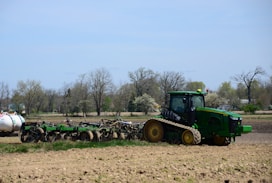 a tractor is parked in the middle of a field