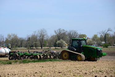 a tractor is parked in the middle of a field
