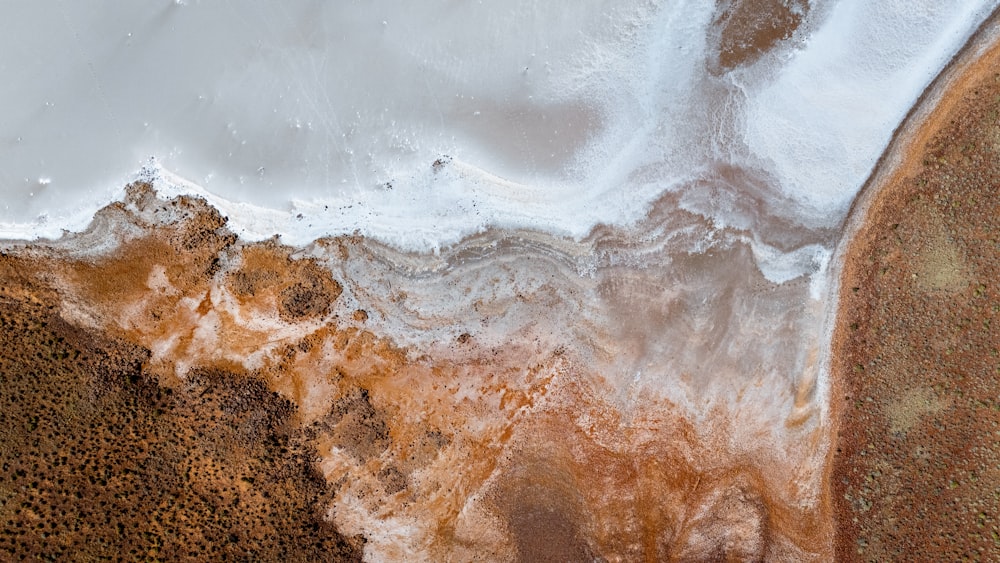 an aerial view of a brown and white area