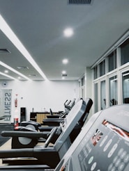 a row of treadmills in a gym