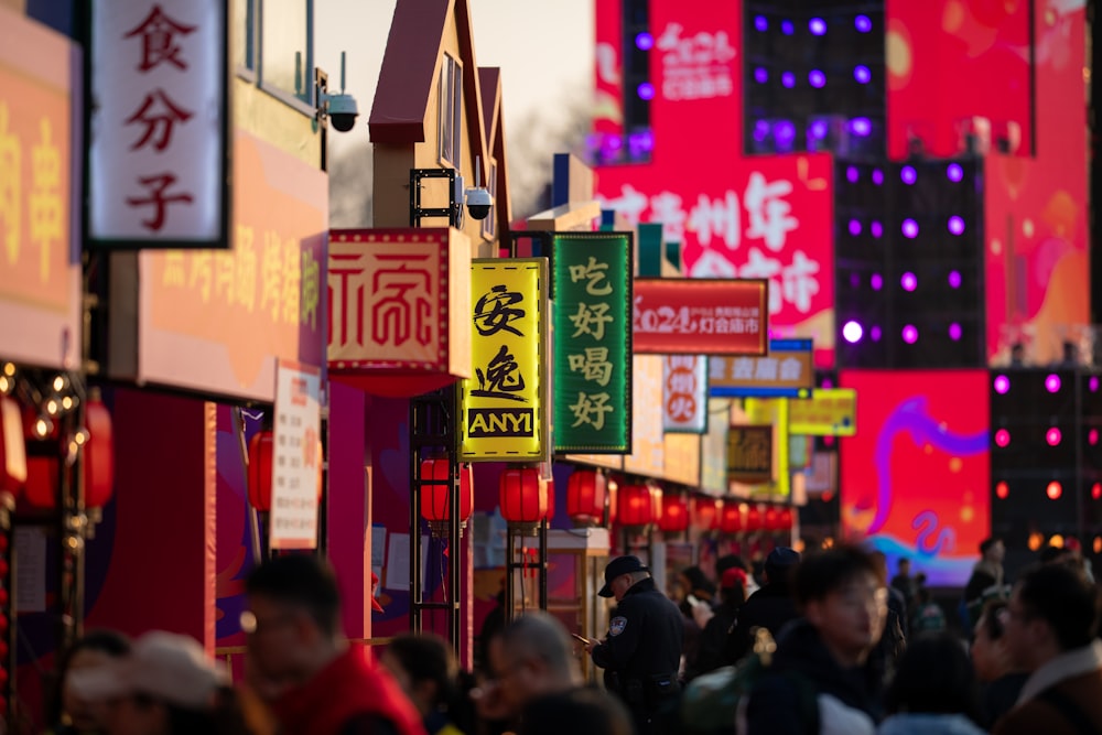 a city street filled with lots of colorful signs