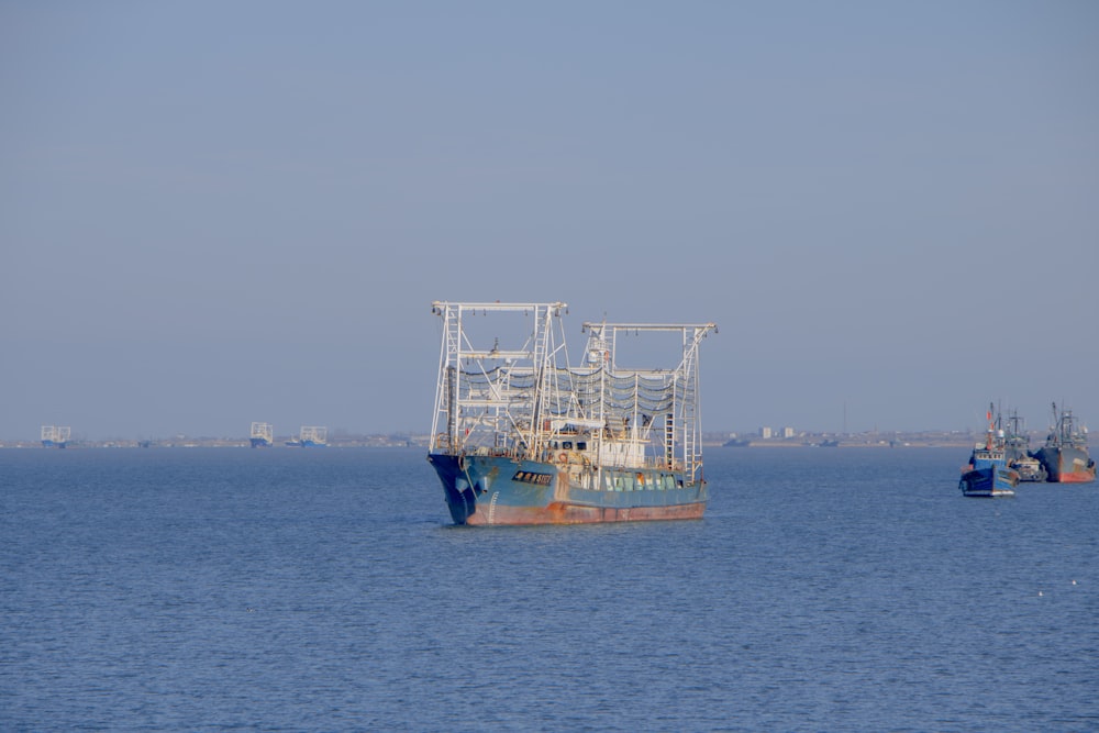 a large boat floating on top of a large body of water