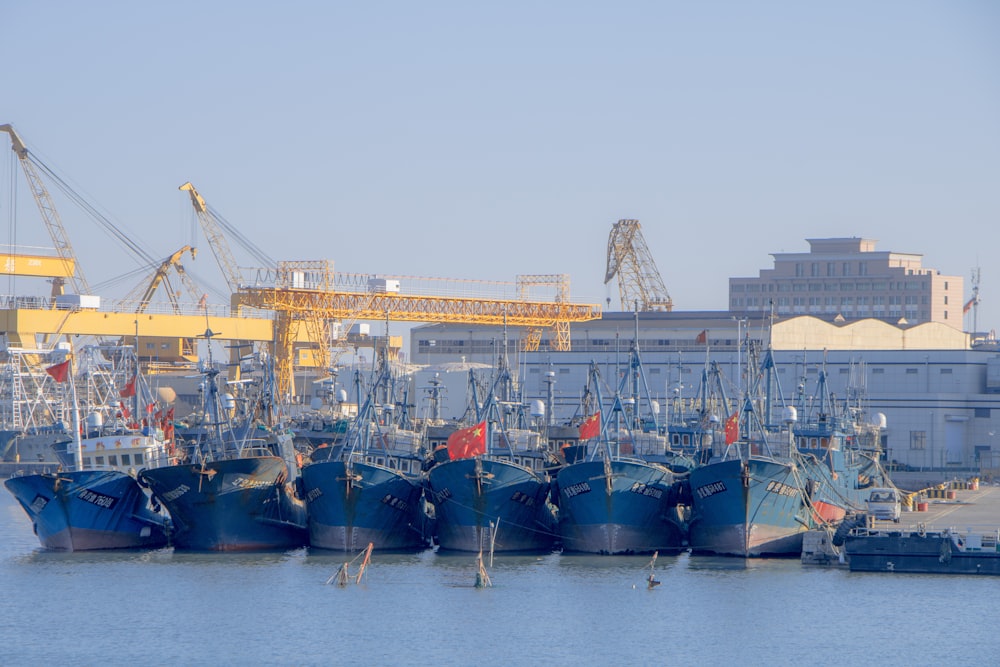 a bunch of boats that are sitting in the water