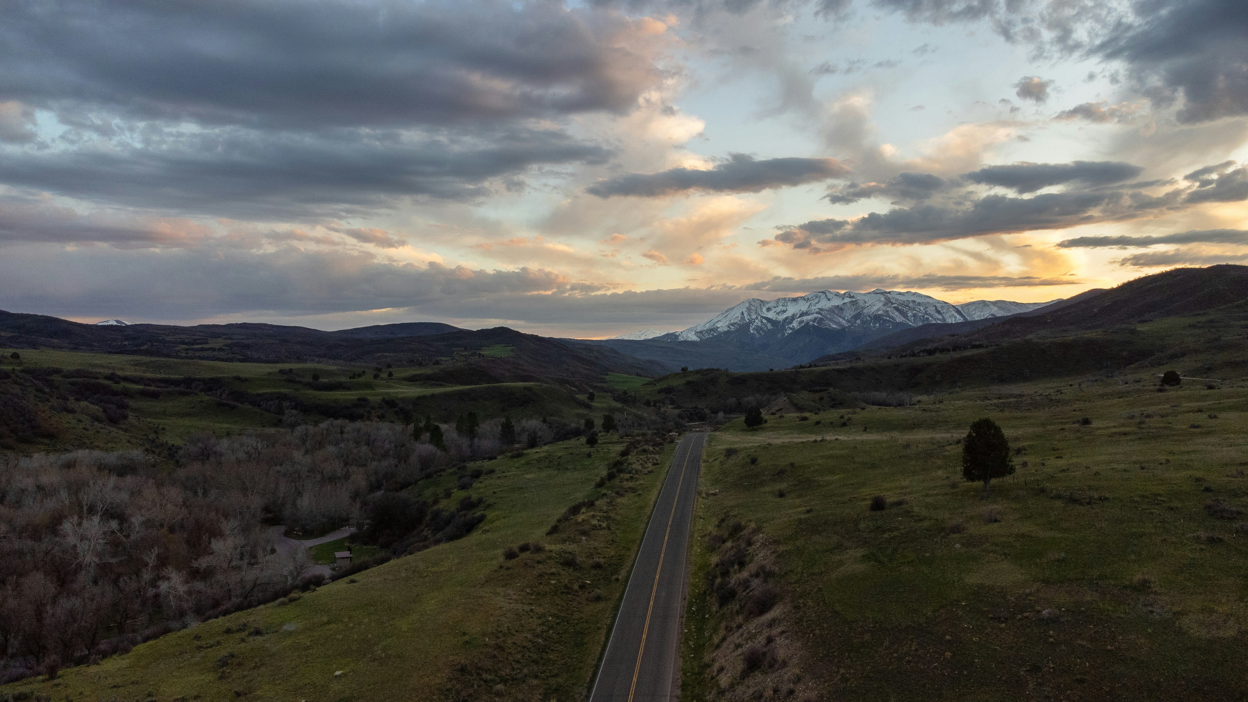 An aerial view of a road in the mountains