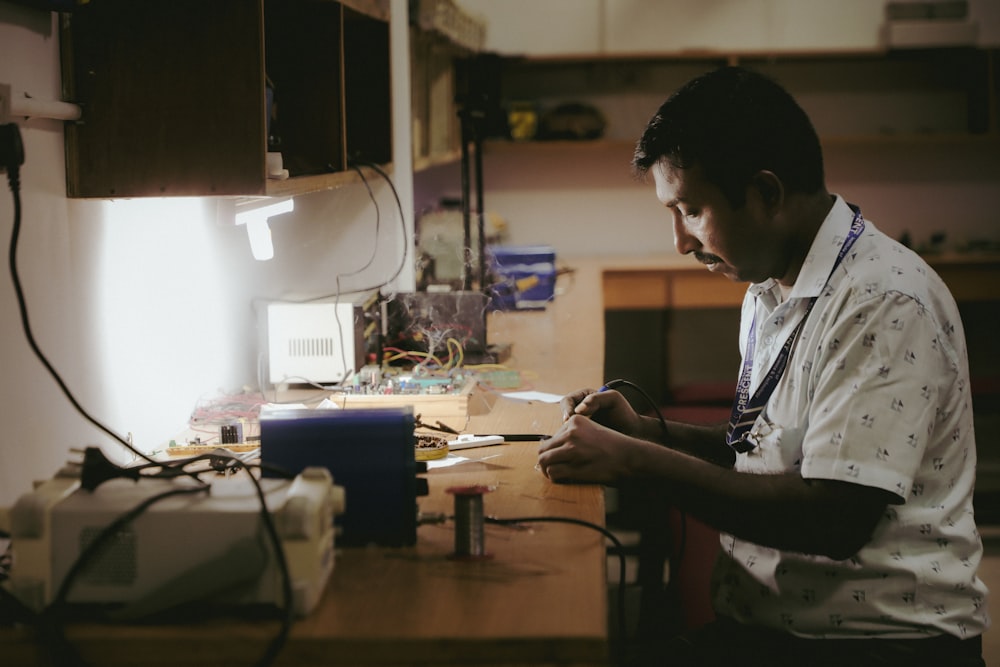 a man working on a project in a workshop