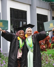 a couple of women standing next to each other