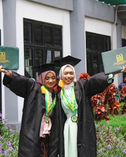 a couple of women standing next to each other