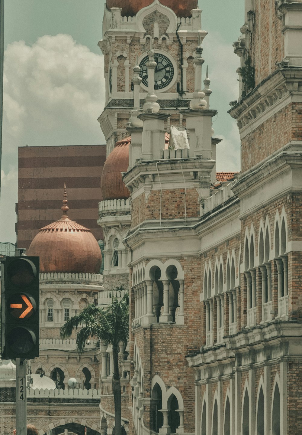 a large clock tower towering over a city