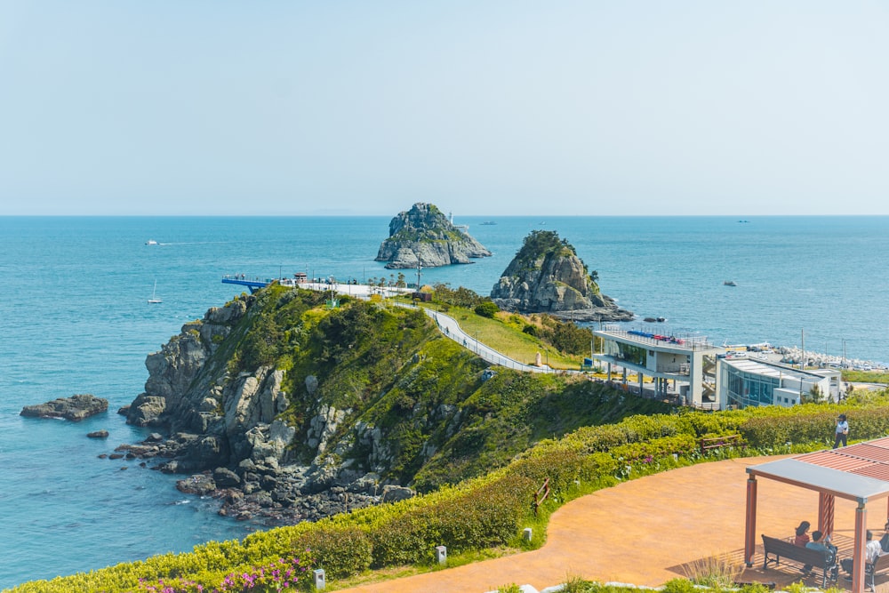 a scenic view of the ocean from a hill