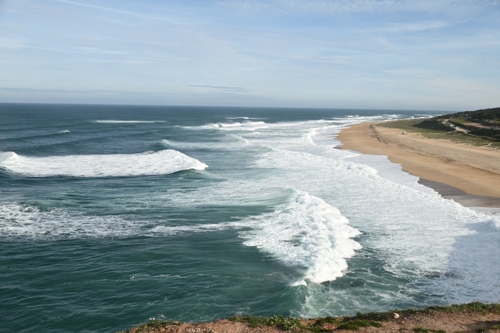 a view of the ocean from a cliff