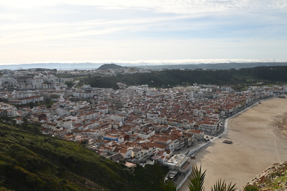 a view of a city from a hill