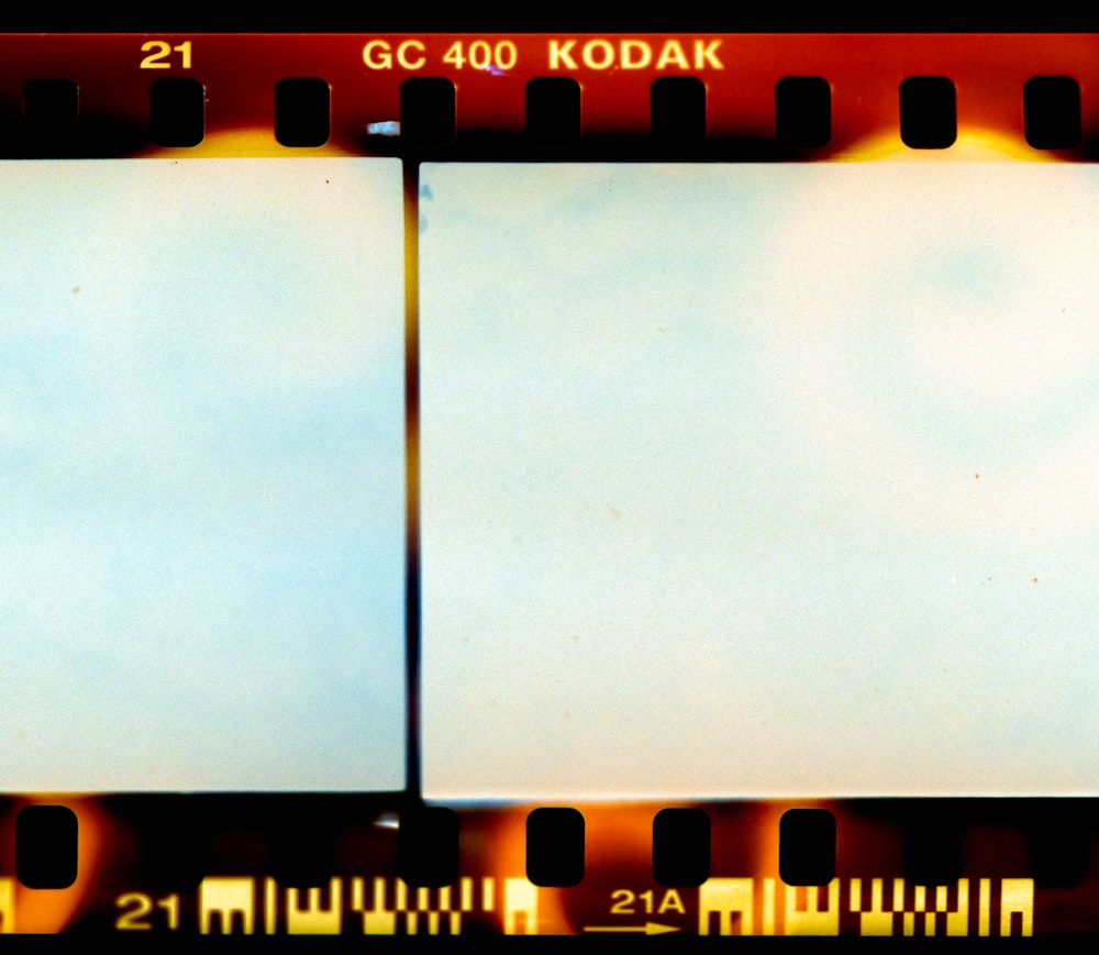 two polaroid film frames with a sky in the background