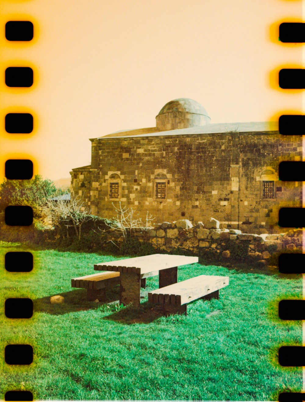a film strip with a picture of a picnic table