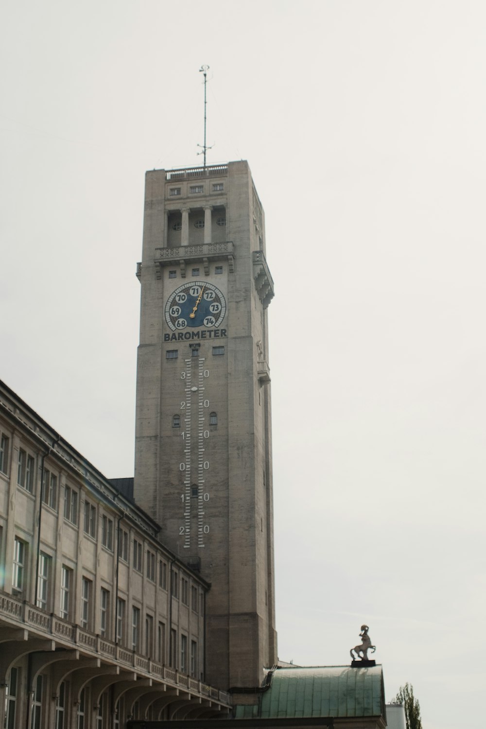 a tall clock tower towering over a city