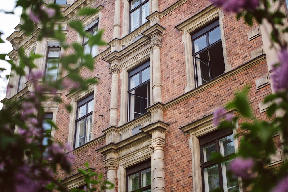 a tall brick building with lots of windows