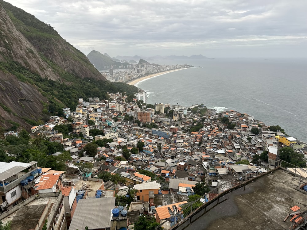 a view of a large city next to the ocean