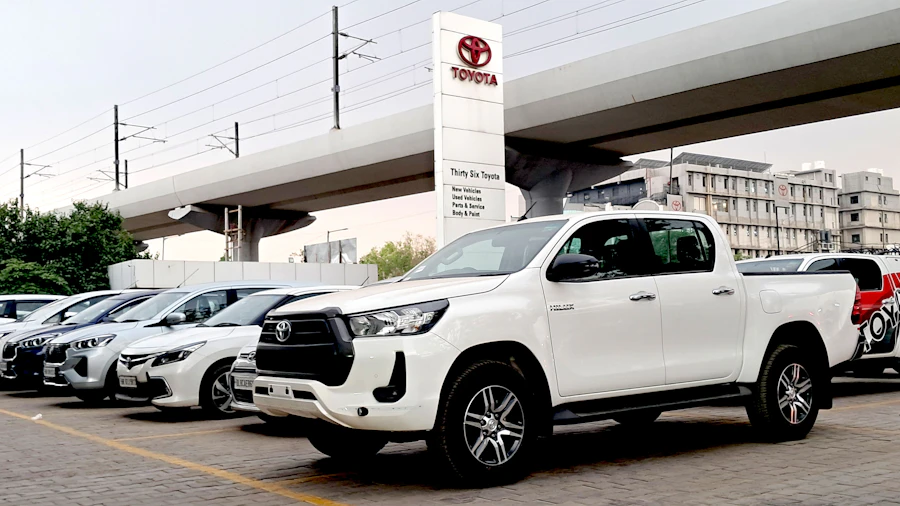 Fleet of Toyota Hilux bakkies parked for corporate rental
