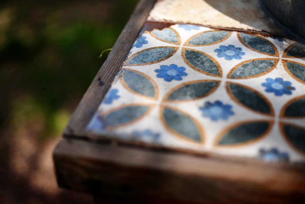 a close up of a tile on a table
