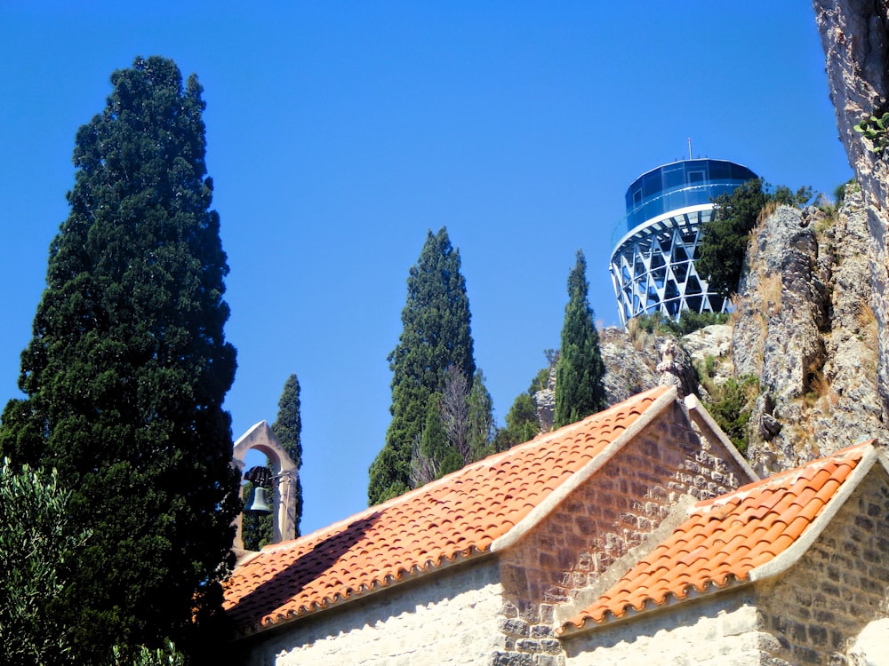 a building with a water tower in the background