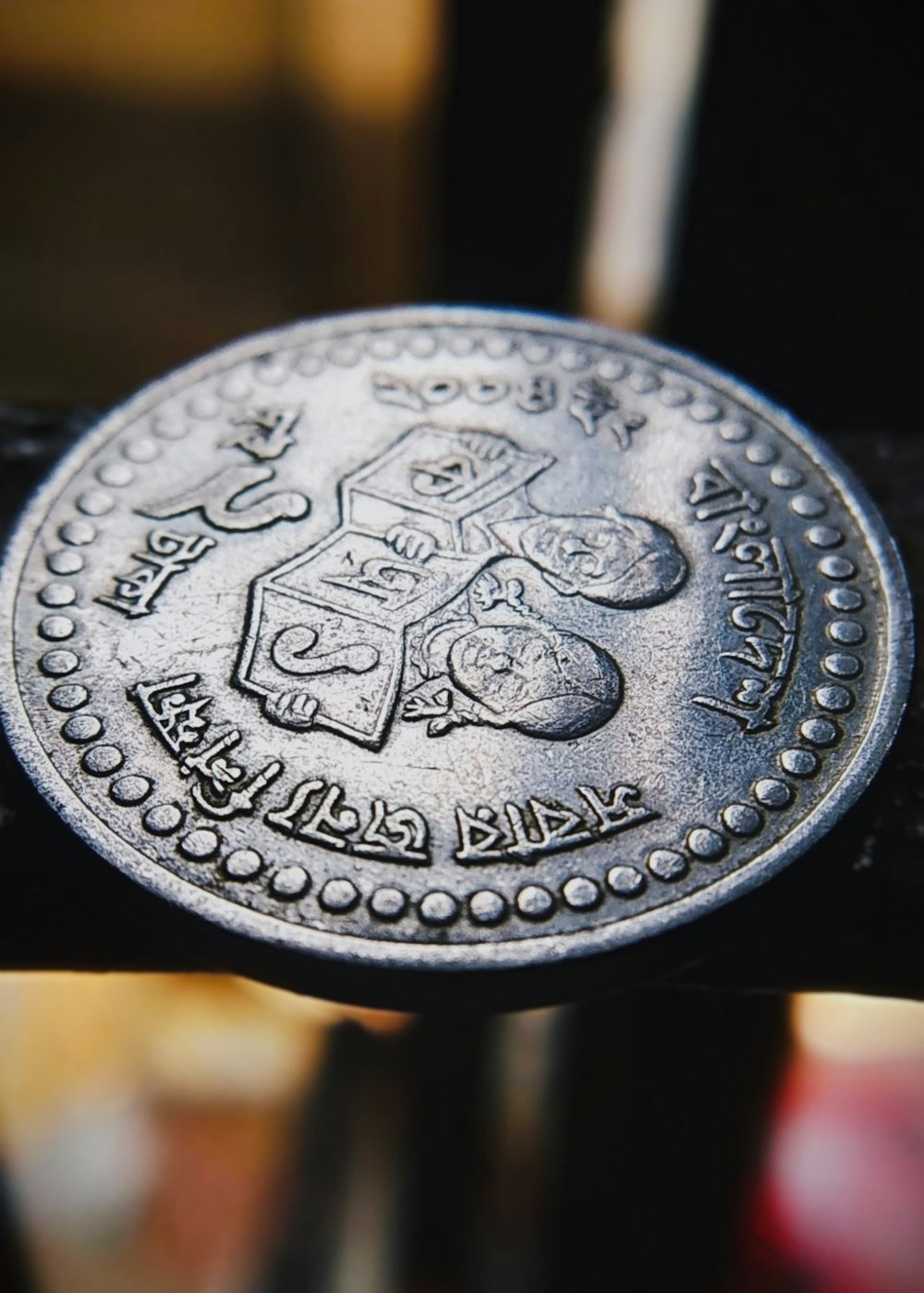 a close up of a coin on a table