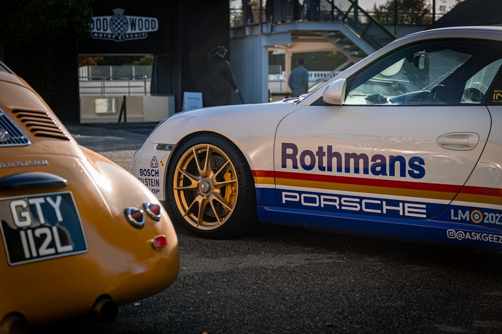 a porsche sports car parked in a parking lot