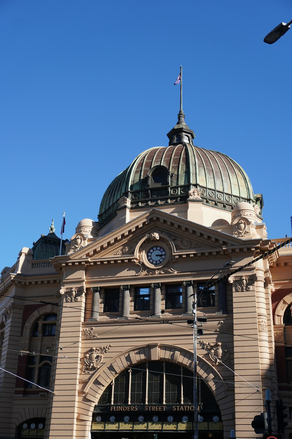 a large building with a clock on the top of it