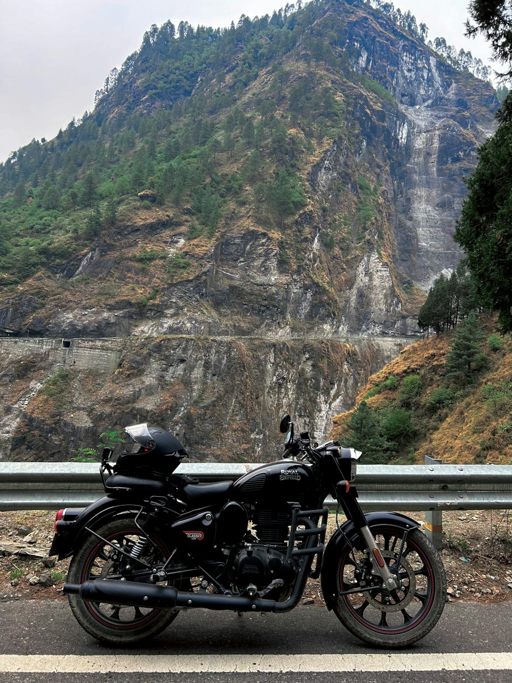 a motorcycle parked on the side of a road