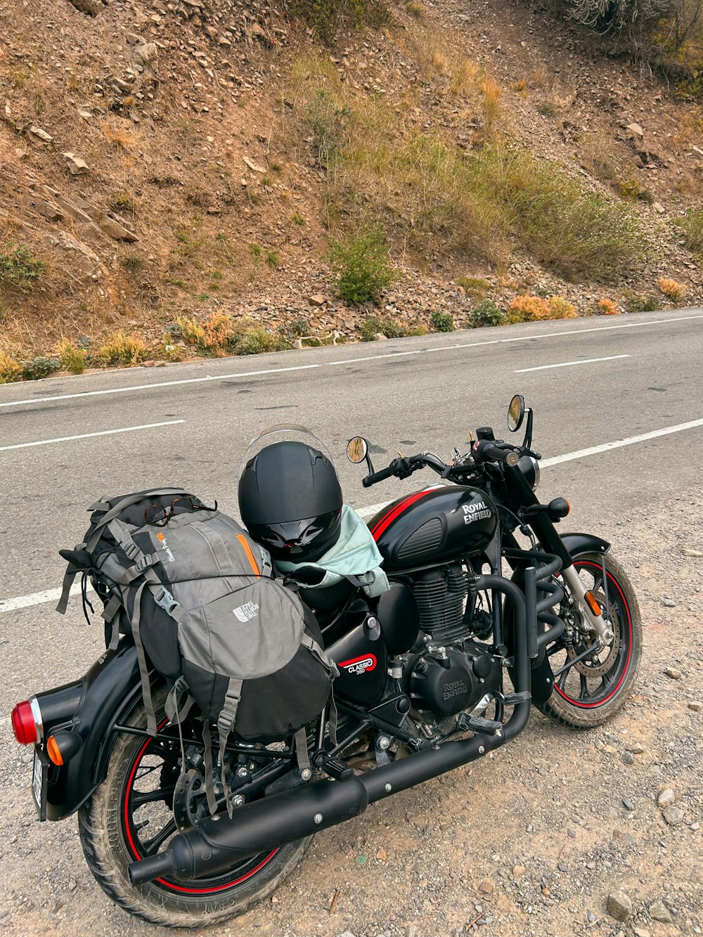 a motorcycle parked on the side of the road