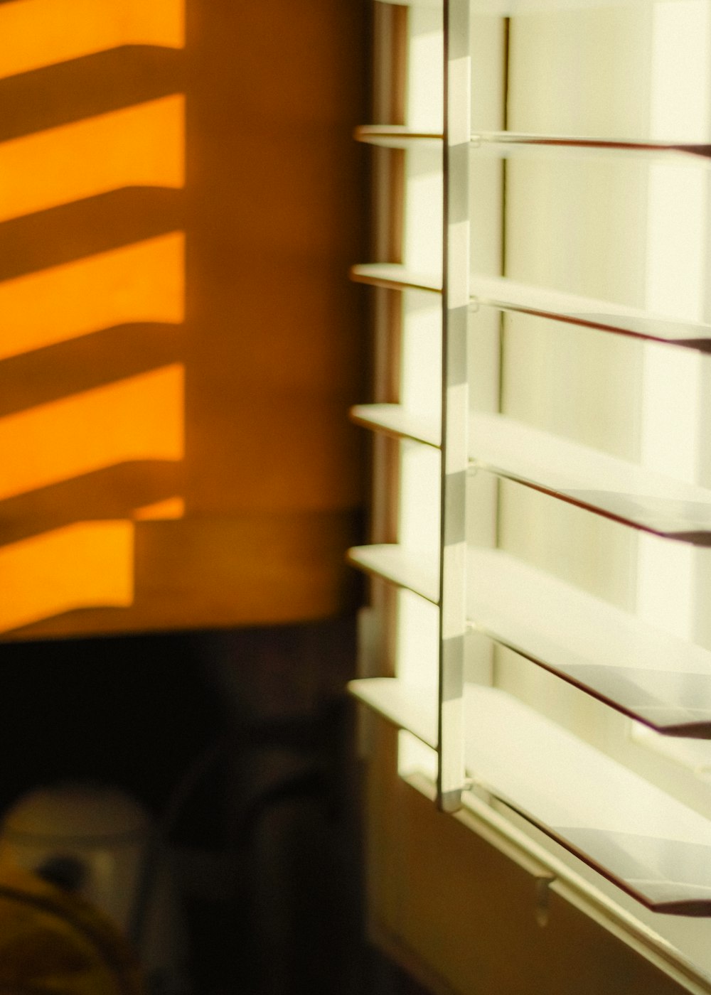 a close up of a window with blinds on it