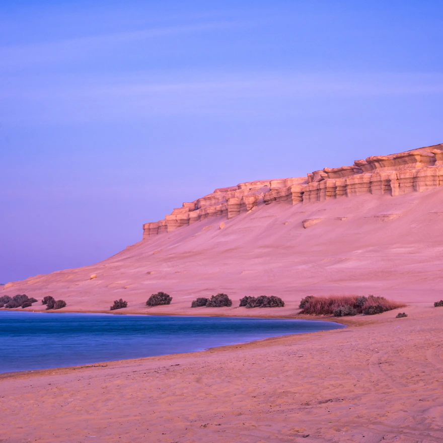 Quad biking through the Egyptian desert hills