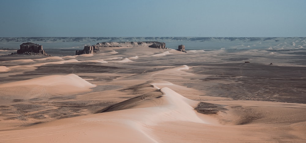 a vast expanse of sand dunes in the desert