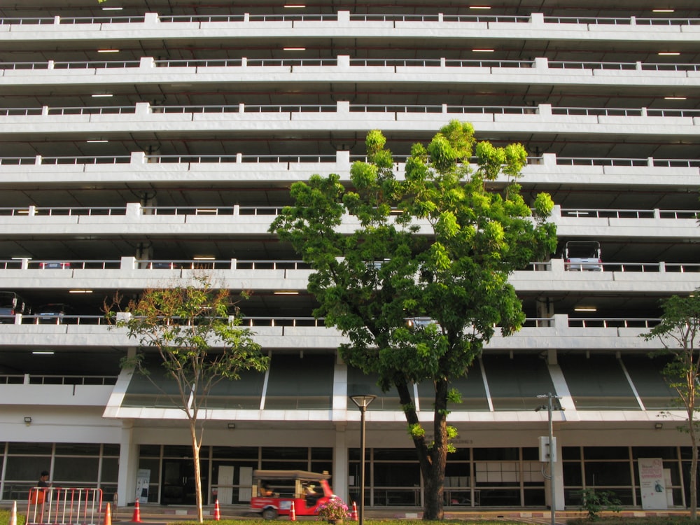 a large building with a tree in front of it