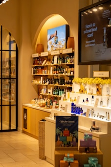 a store filled with lots of bottles of alcohol