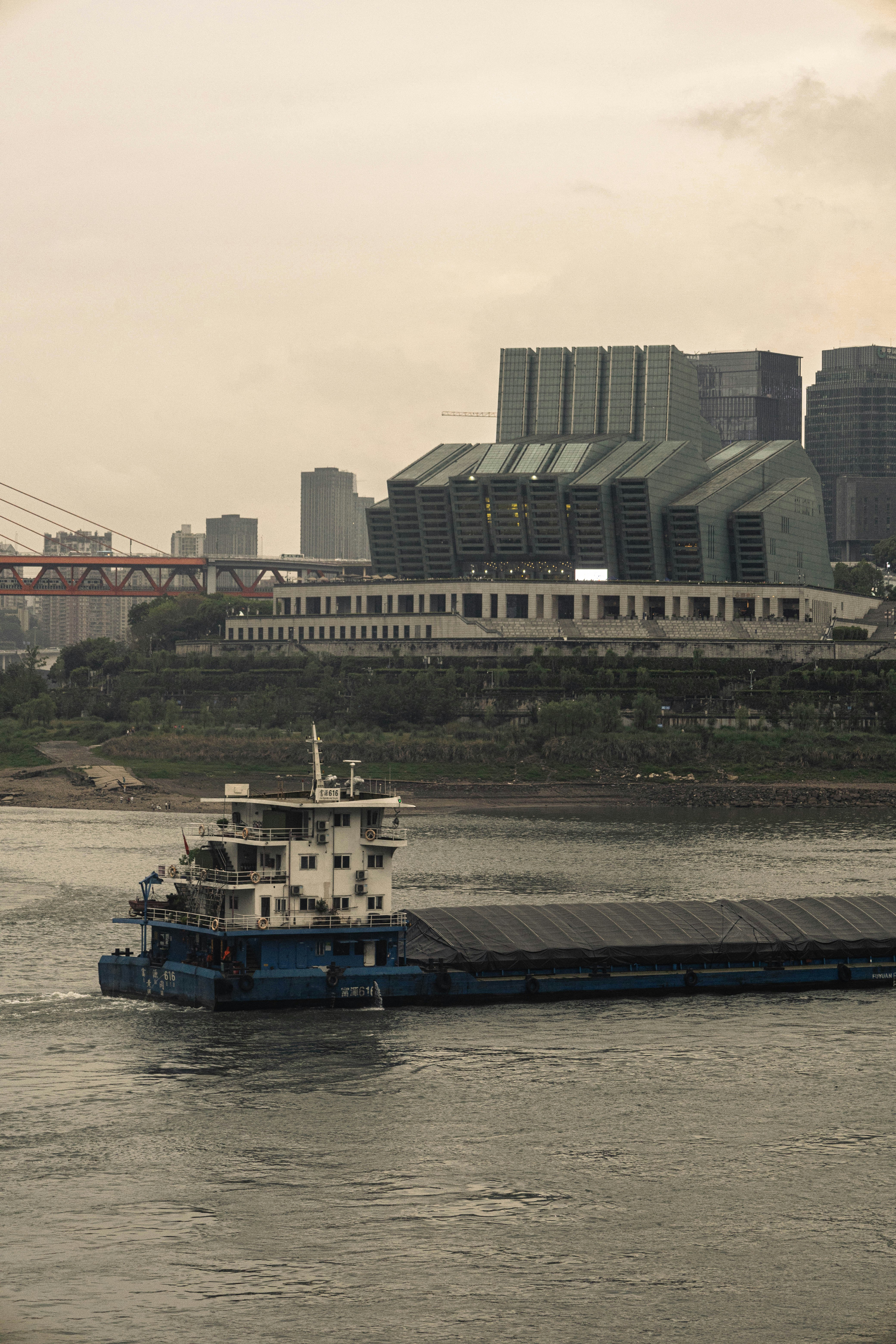 a large boat floating on top of a body of water