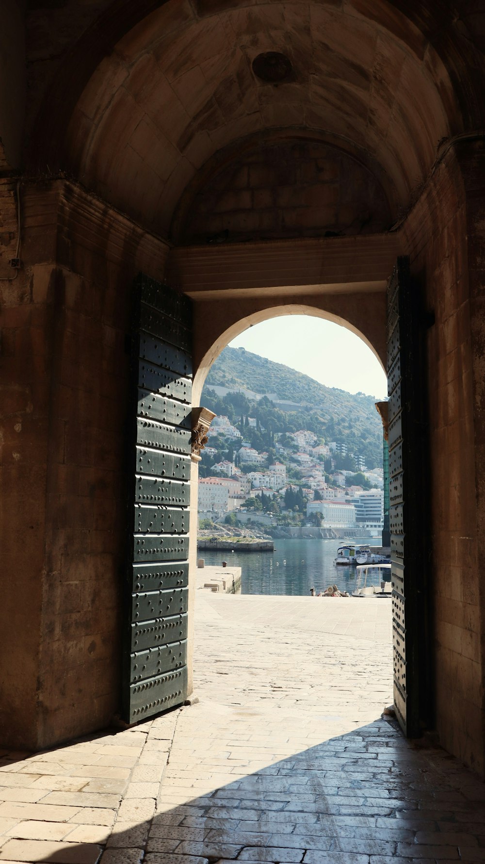 an open doorway with a view of a lake