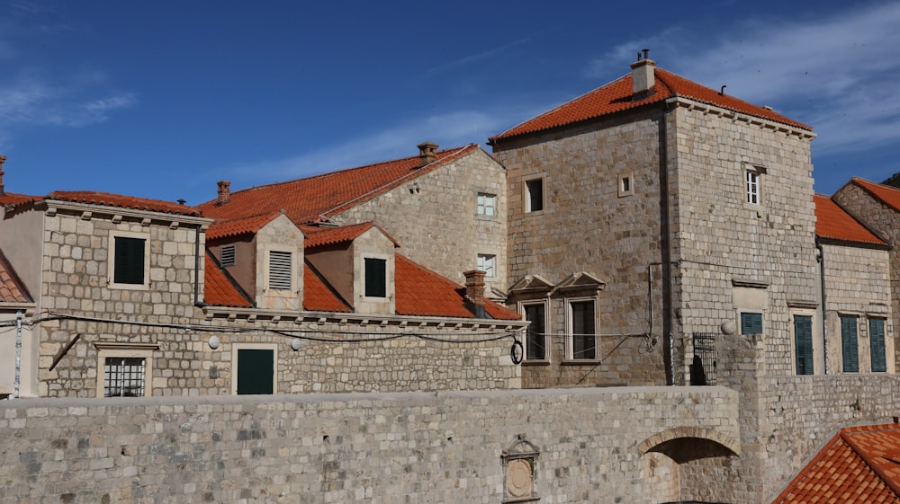 a large brick building with a clock tower